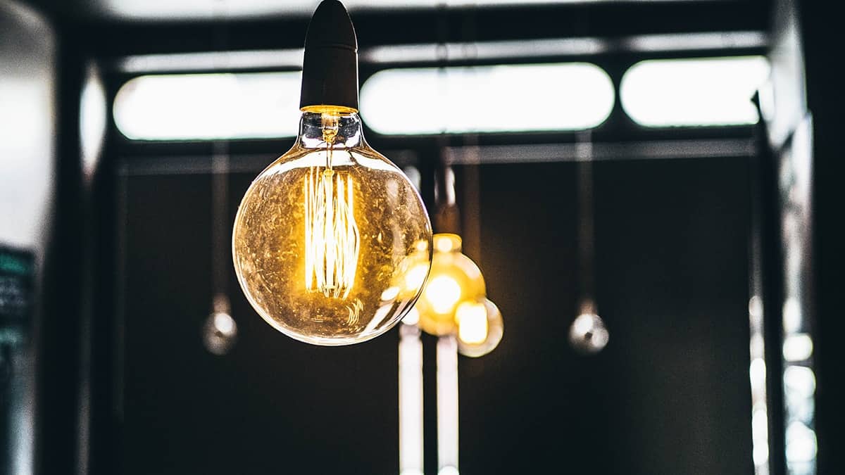 A row of old-fashioned light bulbs lit up.