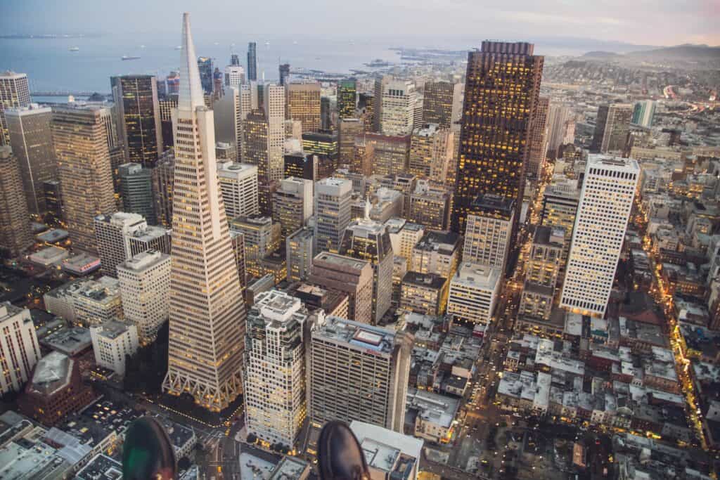 Aerial view of skyscrapers in city during the daytime