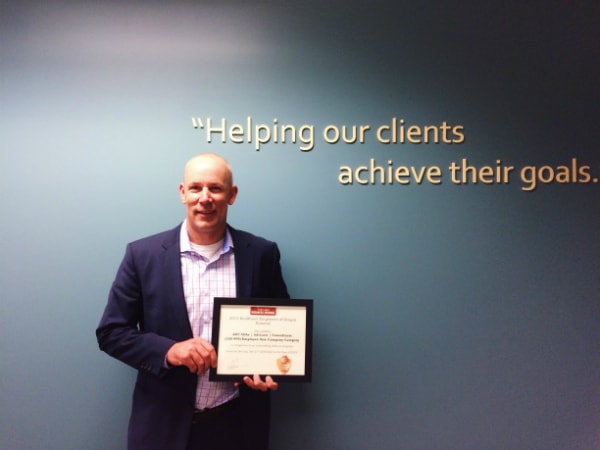 Aldrich Advisor holding 2015 award for Healthiest Employers of Oregon