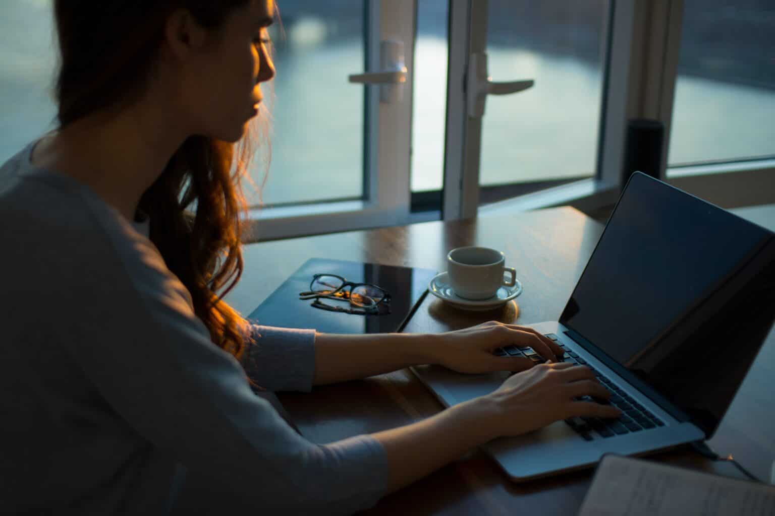 Woman on her laptop enables MFA