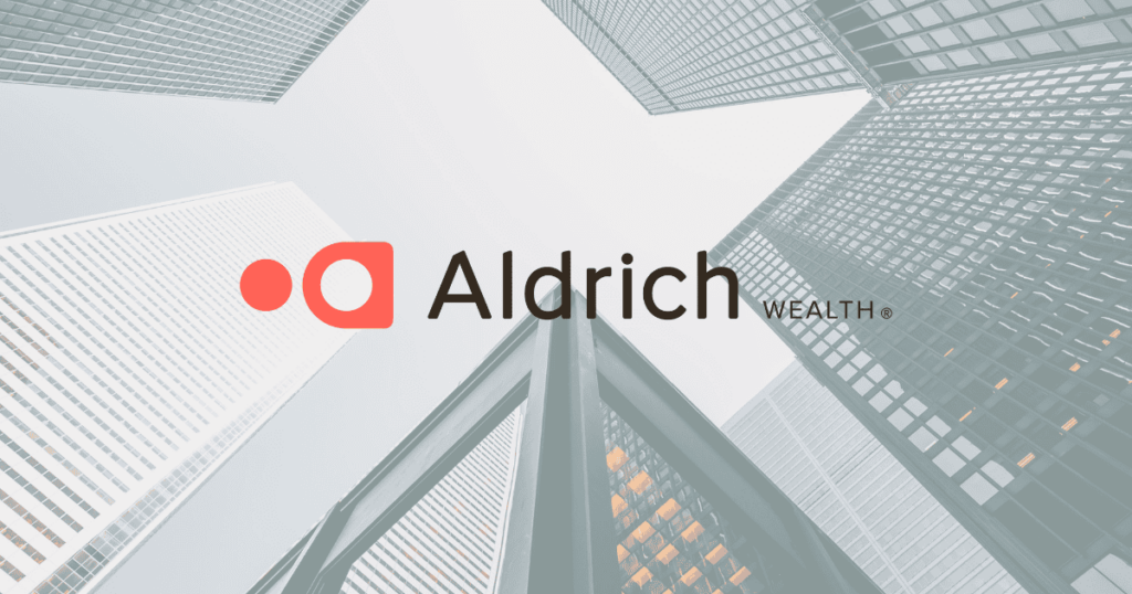 Aldrich Wealth logo with sky scrappers in sunlight